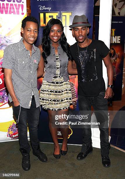 Tyler James Williams, Coco Jones and Brandon Mychal Smith attend the Disney Channel's "Let It Shine" cast autograph signing at the Disney Store on...
