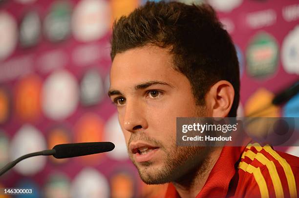 In this handout image provided by UEFA, Jordi Alba of Spain talks to the media during a UEFA EURO 2012 press conference at the Municipal Stadium on...