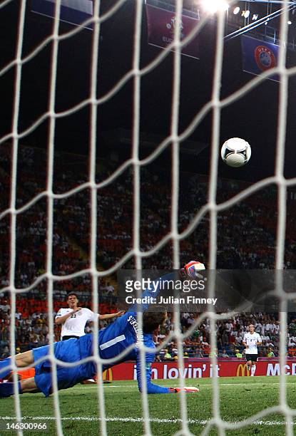 Mario Gomez of Germany scores their second goal past Maarten Stekelenburg of Netherlands during the UEFA EURO 2012 group B match between Netherlands...