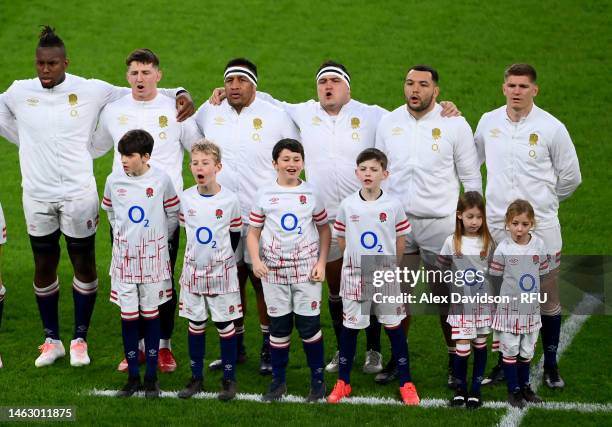 Maro Itoje, Ben Curry, Mako Vunipola, Jamie George, Ellis Genge and Owen Farrell of England sing the National Anthem during the Six Nations Rugby...