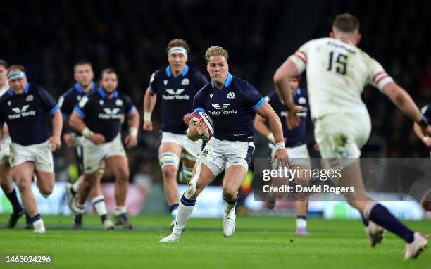 Duhan van der Merwe of Scotland breaks with the ball to score his first and Scotland's second try during the Six Nations Rugby match between England...