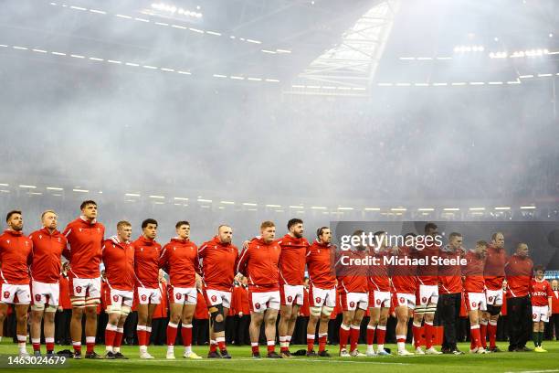 The Wales team line up ahead of the national anthems during the Six Nations Rugby match between Wales and Ireland at Principality Stadium on February...