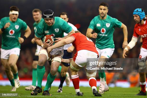 James Ryan of Ireland runs at Jac Morgan of Wales during the Six Nations Rugby match between Wales and Ireland at Principality Stadium on February...