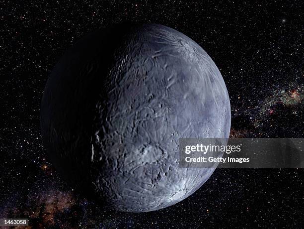 An artist's rendition of the largest object found orbiting the Sun since Pluto was discovered in 1930, is shown October 7, 2002. The object called...