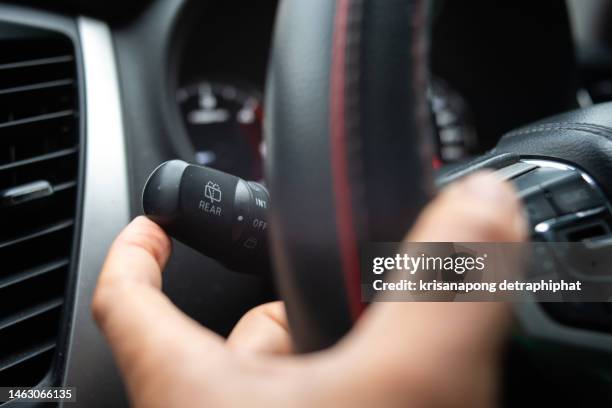 car,wiper button,wiper,steering wheel,drive a car - ruitenwisser stockfoto's en -beelden