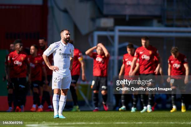 Daniel Carvajal of Real Madrid CF reacts after Vedat Muriqi of RCD Mallorca scored his team's first goal during the LaLiga Santander match between...