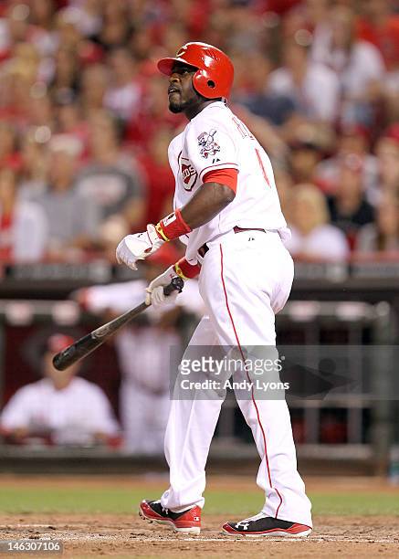 Brandon Phillips of the Cincinnati Reds hits a home run during the game against the Cleveland Indians at Great American Ball Park on June 13, 2012 in...