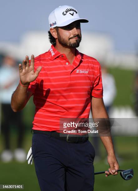 Abraham Ancer of Mexico celebrates on the 18th hole after to winning the PIF Saudi International at Royal Greens Golf & Country Club on February 05,...