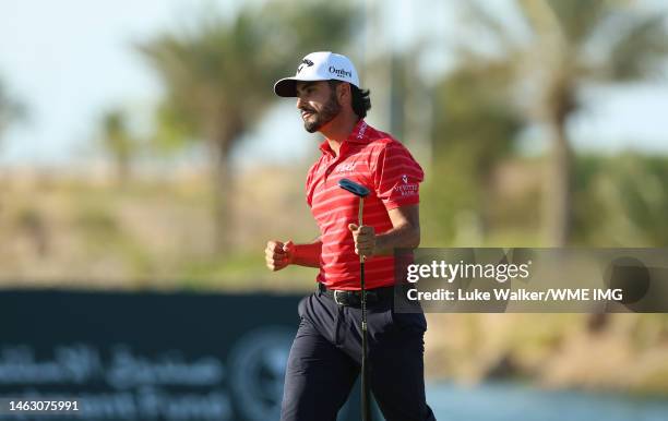 Abraham Ancer of Mexico celebrates on the 18th hole after winning the PIF Saudi International at Royal Greens Golf & Country Club on February 05,...