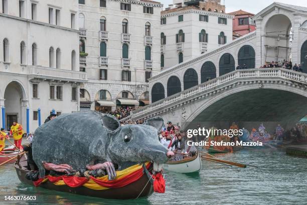 The boat carrying the "Pantegana" large rat, made of paper mache, transits during the carnival regatta in the Grand Canal on February 05, 2023 in...