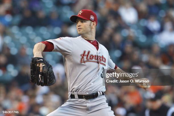 Happ of the Houston Astros pitches against the San Francisco Giants during the first inning at AT&T Park on June 13, 2012 in San Francisco,...