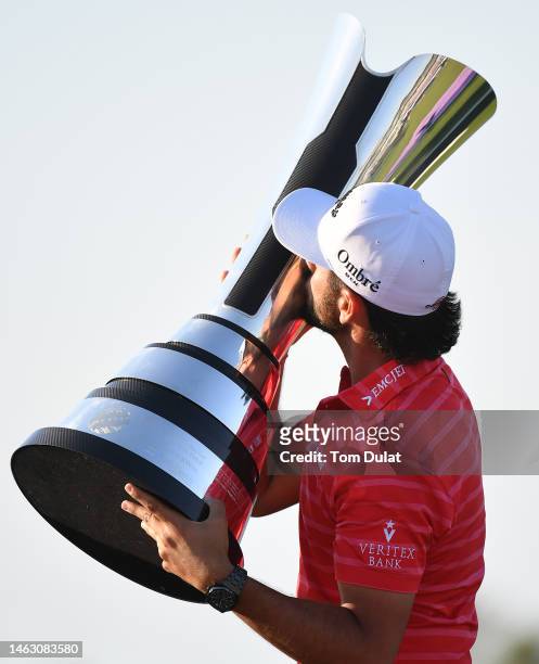 Abraham Ancer of Mexico poses with the trophy after winning the PIF Saudi International at Royal Greens Golf & Country Club on February 05, 2023 in...
