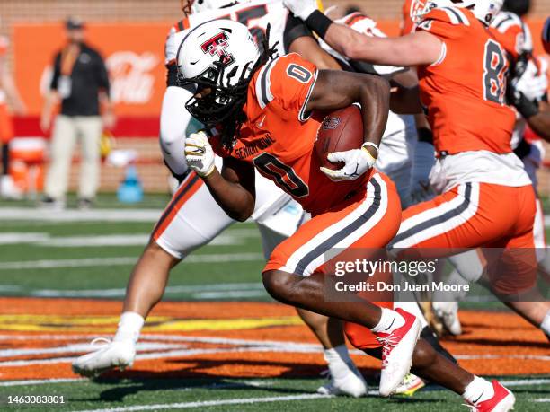 Runnignback SaRodorick Thompson of Texas Tech from the National Team on a running play during the 2023 Resse's Senior Bowl at Hancock Whitney Stadium...