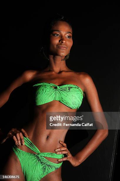 Carmelita Mendes poses backstage at the Agua de Coco por Liana Thomaz show during Sao Paulo Fashion Week Spring/Summer 2013 on June 13, 2012 in Sao...