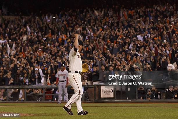 Matt Cain of the San Francisco Giants celebrates after pitching a perfect game against the Houston Astros at AT&T Park on June 13, 2012 in San...