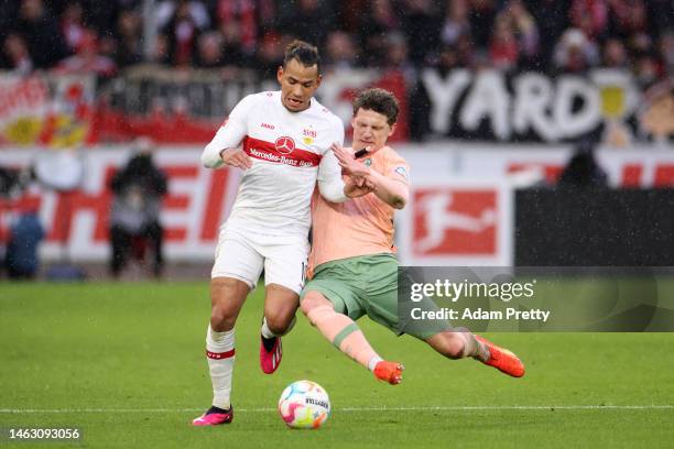 Juan Jose Perea of VfB Stuttgart is challenged by Jens Stage of SV Werder Bremen during the Bundesliga match between VfB Stuttgart and SV Werder...