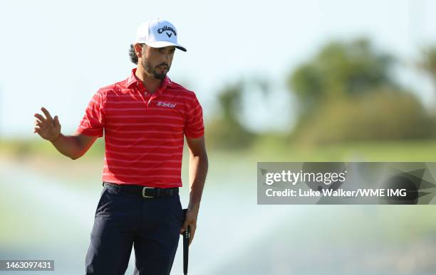 Abraham Ancer of Mexico celebrates on the 18th hole after winning the PIF Saudi International at Royal Greens Golf & Country Club on February 05,...