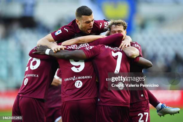 Yann Karamoh of Torino FC celebrates with teammates after scoring the team's first goal during the Serie A match between Torino FC and Udinese Calcio...