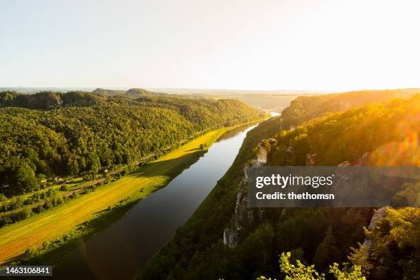 river elbe during sunset,  saxon switzerland national park, saxony, germany - elbe stock-fotos und bilder