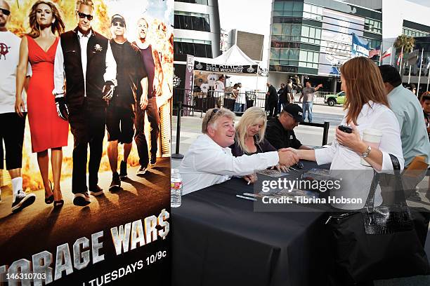 Dan Dotson, Laura Dotson and Dave Hester attend A&E's 'Storage Wars' Lockbuster Tour at Nokia Plaza L.A. LIVE on June 13, 2012 in Los Angeles,...