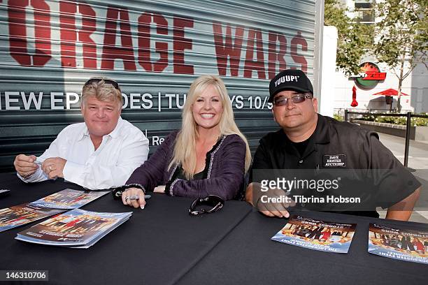 Dan Dotson, Laura Dotson and Dave Hester attend A&E's 'Storage Wars' Lockbuster Tour at Nokia Plaza L.A. LIVE on June 13, 2012 in Los Angeles,...