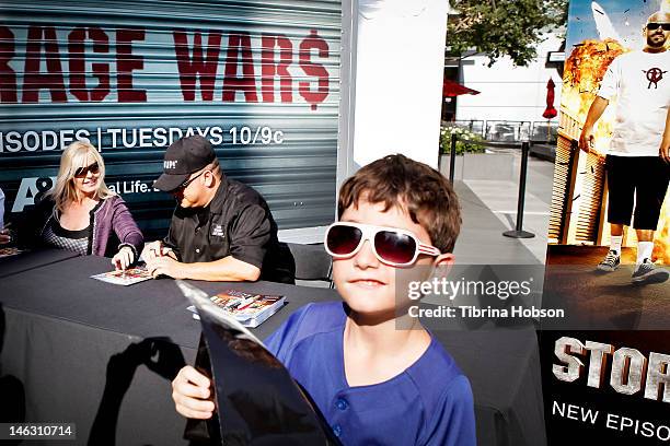 Laura Dotson and Dave Hester attend A&E's 'Storage Wars' Lockbuster Tour at Nokia Plaza L.A. LIVE on June 13, 2012 in Los Angeles, California.