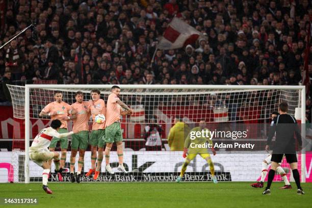 Genki Haraguchi of Vfb Stuttgart shoots from a free kick during the Bundesliga match between VfB Stuttgart and SV Werder Bremen at Mercedes-Benz...