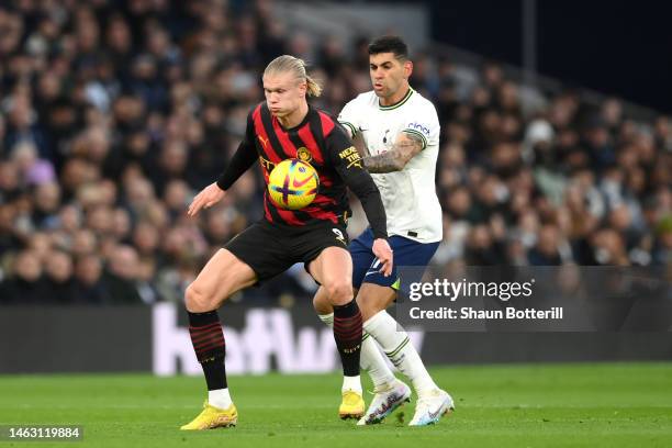 Erling Haaland of Manchester City is challenged by Cristian Romero of Tottenham Hotspur during the Premier League match between Tottenham Hotspur and...