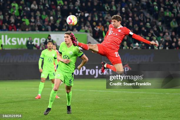 Thomas Mueller of Bayern Munich scores the team's first goal during the Bundesliga match between VfL Wolfsburg and FC Bayern München at Volkswagen...