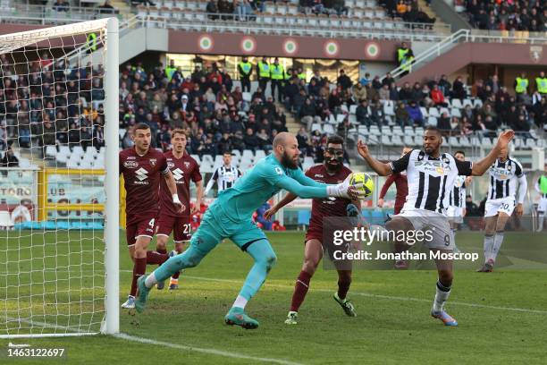 Vanja Milinkovic-Savic of Torino FC snatches the ball from the toe of Beto of Udinese Calcio during the Serie A match between Torino FC and Udinese...