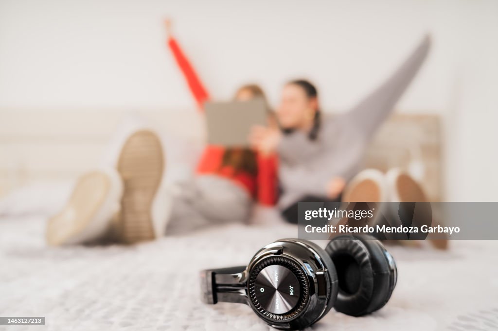 Bluetooth headphones on the bed