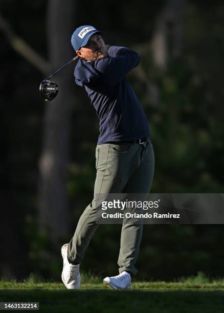 Austin Cook of the United States plays his shot from the sixth tee during a continuation of the third round of the AT&T Pebble Beach Pro-Am at...