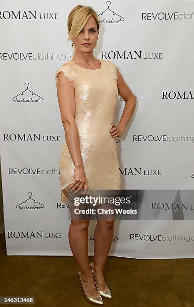 Actress Mena Suvari attends a party launching Roman Luxe hosted by RevolveClothing.com and Karla Deras at on June 13, 2012 in Los Angeles, California.