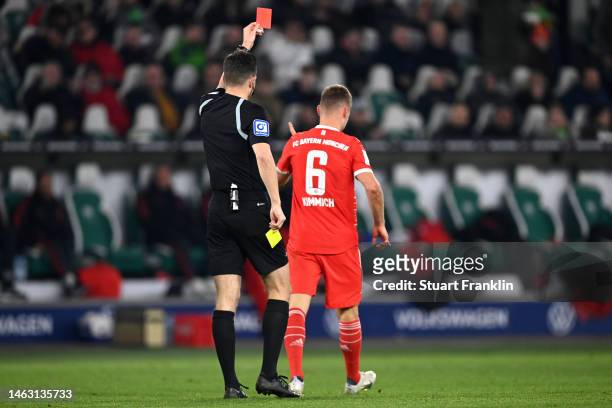 Joshua Kimmich of Bayern Munich is shown a red card by Referee, Harm Osmers during the Bundesliga match between VfL Wolfsburg and FC Bayern München...