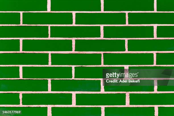 green brick wall - ceramic green stock pictures, royalty-free photos & images