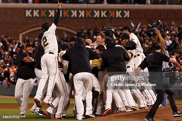 Matt Cain of the San Francisco Giants is congratulated by teammates after the game against the Houston Astros at AT&T Park on June 13, 2012 in San...