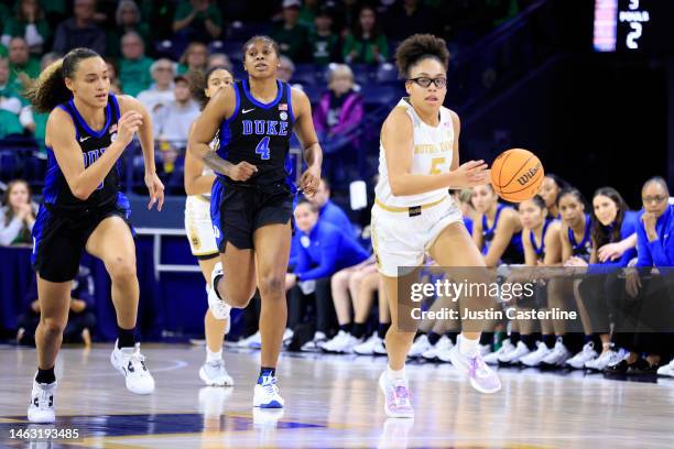 Olivia Miles of the Notre Dame Fighting Irish brings the ball up the court in the game against the Duke Blue Devils during the second half of the...