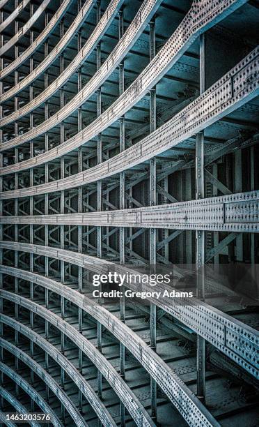 steel girders under a bridge - steel frame stock pictures, royalty-free photos & images