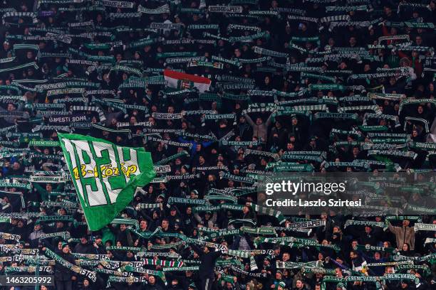 Ultra supporters of Ferencvarosi TC lift scarves over their heads during the Hungarian OTP Bank Liga match between Ferencvarosi TC and Ujpest FC at...