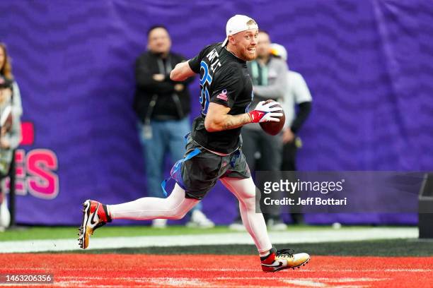 George Kittle of the San Francisco 49ers and NFC scores a touchdown against the AFC during the 2023 NFL Pro Bowl Games at Allegiant Stadium on...