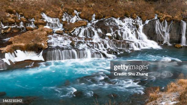 hraunfossar waterfalls - hraunfossar stock pictures, royalty-free photos & images