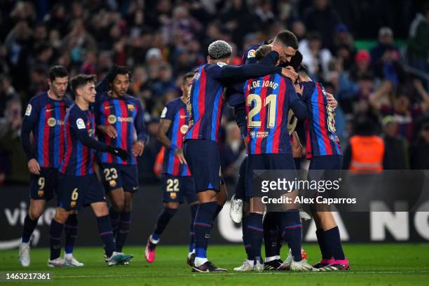 Jordi Alba of FC Barcelona celebrates with teammates after scoring the team's first goal during the LaLiga Santander match between FC Barcelona and...