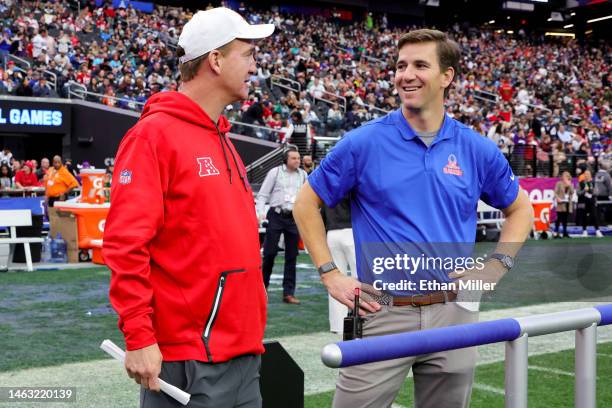 Head coach Peyton Manning and NFC head coach Eli Manning talk during the 2023 NFL Pro Bowl Games at Allegiant Stadium on February 05, 2023 in Las...