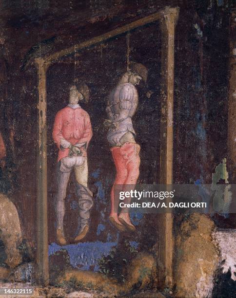 The hanged men, detail from of St George and the Princess, 1433-1435, by Antonio Pisano known as Pisanello , fresco, 223x430 cm. Church of Santa...