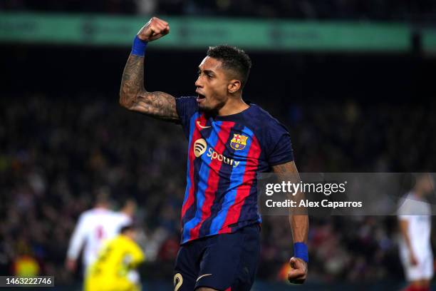 Raphinha of FC Barcelona celebrates after scoring the team's third goal during the LaLiga Santander match between FC Barcelona and Sevilla FC at...