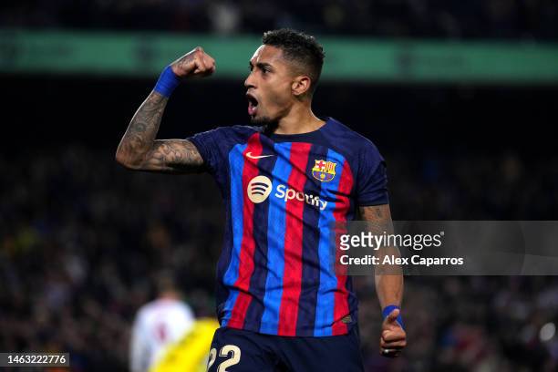 Raphinha of FC Barcelona celebrates after scoring the team's third goal during the LaLiga Santander match between FC Barcelona and Sevilla FC at...