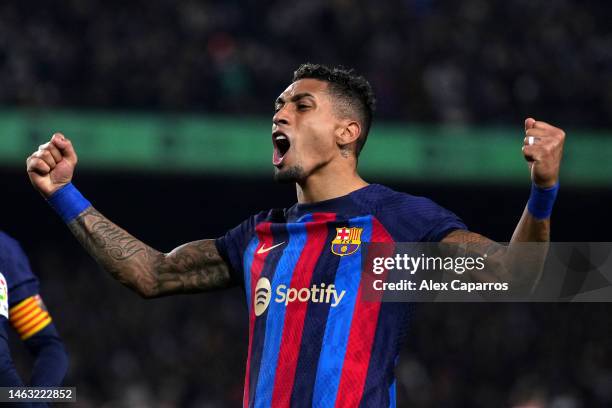 Raphinha of FC Barcelona celebrates after scoring the team's third goal during the LaLiga Santander match between FC Barcelona and Sevilla FC at...