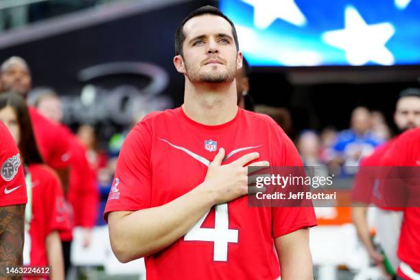 Derek Carr of the Las Vegas Raiders and AFC looks on during the national anthem during the 2023 NFL Pro Bowl Games at Allegiant Stadium on February...