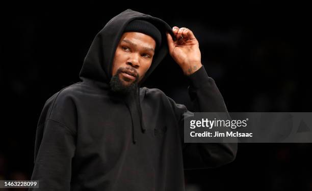 Kevin Durant of the Brooklyn Nets looks on against the Los Angeles Lakers at Barclays Center on January 30, 2023 in New York City. The Nets defeated...