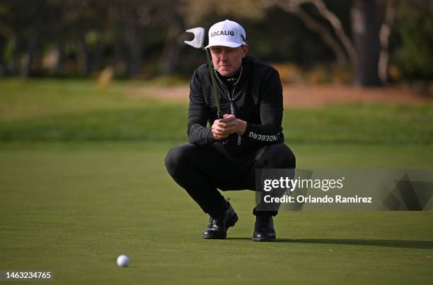 Jonas Blixt of Sweden lines up a putt on the second green during the final round of the AT&T Pebble Beach Pro-Am at Pebble Beach Golf Links on...